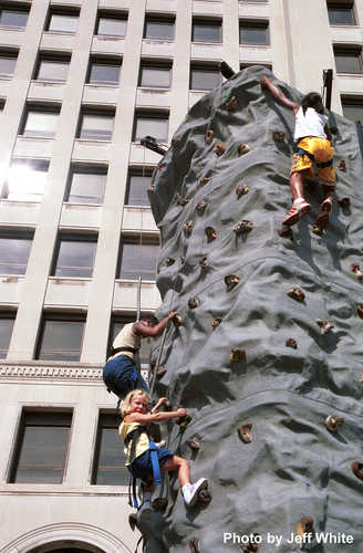 Rock Wall Crowded with Climbers
