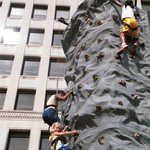 Rock Wall Crowded with Climbers