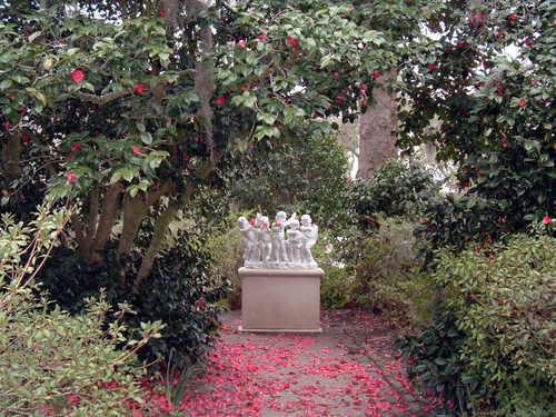 Petal-Peppered Statues at Middleton Place