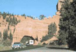 Driving through a Red Canyon Tunnel