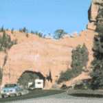 Driving through a Red Canyon Tunnel