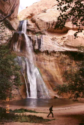 Hiker by Calf Creek Falls