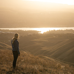 Woman looking at Wenatchee Valley from the Wenatchee Foothills