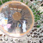 Bottle Necks Around a Spoke Wheel Window at Tinkertown