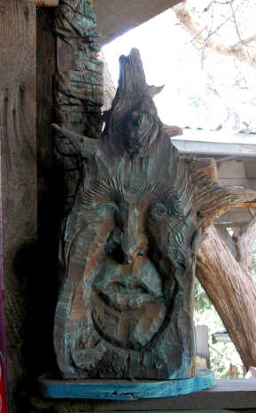 A Face Carved from Wood