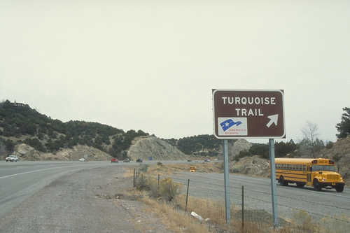 Turquoise Trail Sign with Yellow Bus