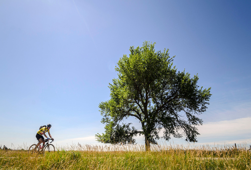Cyclist competes in race held near Flint Hills National Scenic Byway in Kansas.