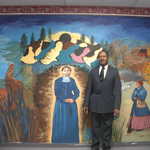 Standing Before the Harriet Tubman Organization Mural