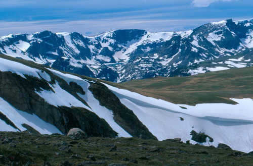 Snow-Covered Mountains in Summer