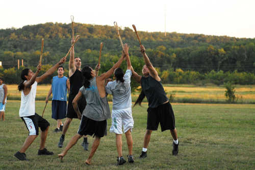 Traditional Game of Stickball Being Played