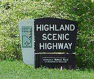 An entrance sign greets visitors to the Highland Scenic Highway