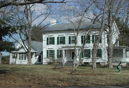 Historic White House with Green Shutters