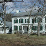 Historic White House with Green Shutters