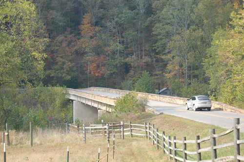 Car Approaching Bridge and Bison Way Trailhead