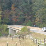 Car Approaching Bridge and Bison Way Trailhead