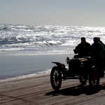Old Steamer Racing Along Beachfront