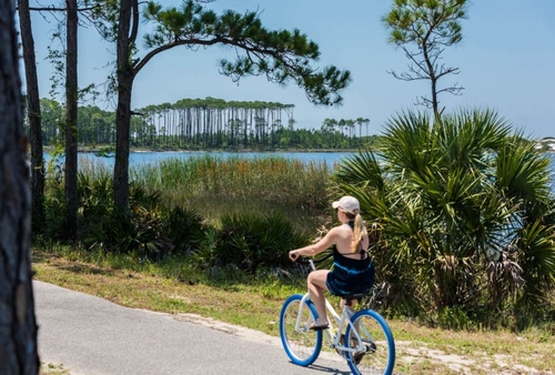 Bicyclist on the Timpoochee Trail in on Scenic 30A in Walton County, Florida