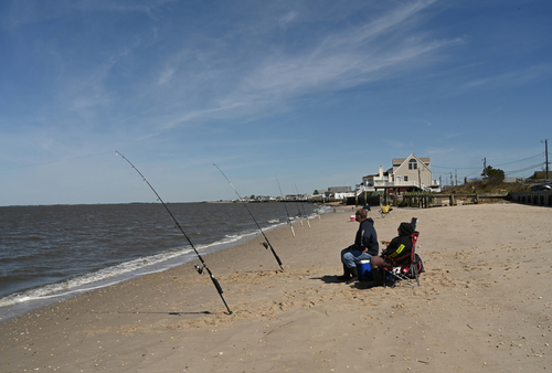 Bayshore Heritage Byway, NJ, Fortescue State Marina and Beaches, Fortescue, Downe Twp. – Striped Bass Fisherman.