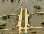 Photo of a flooded highway interchange.