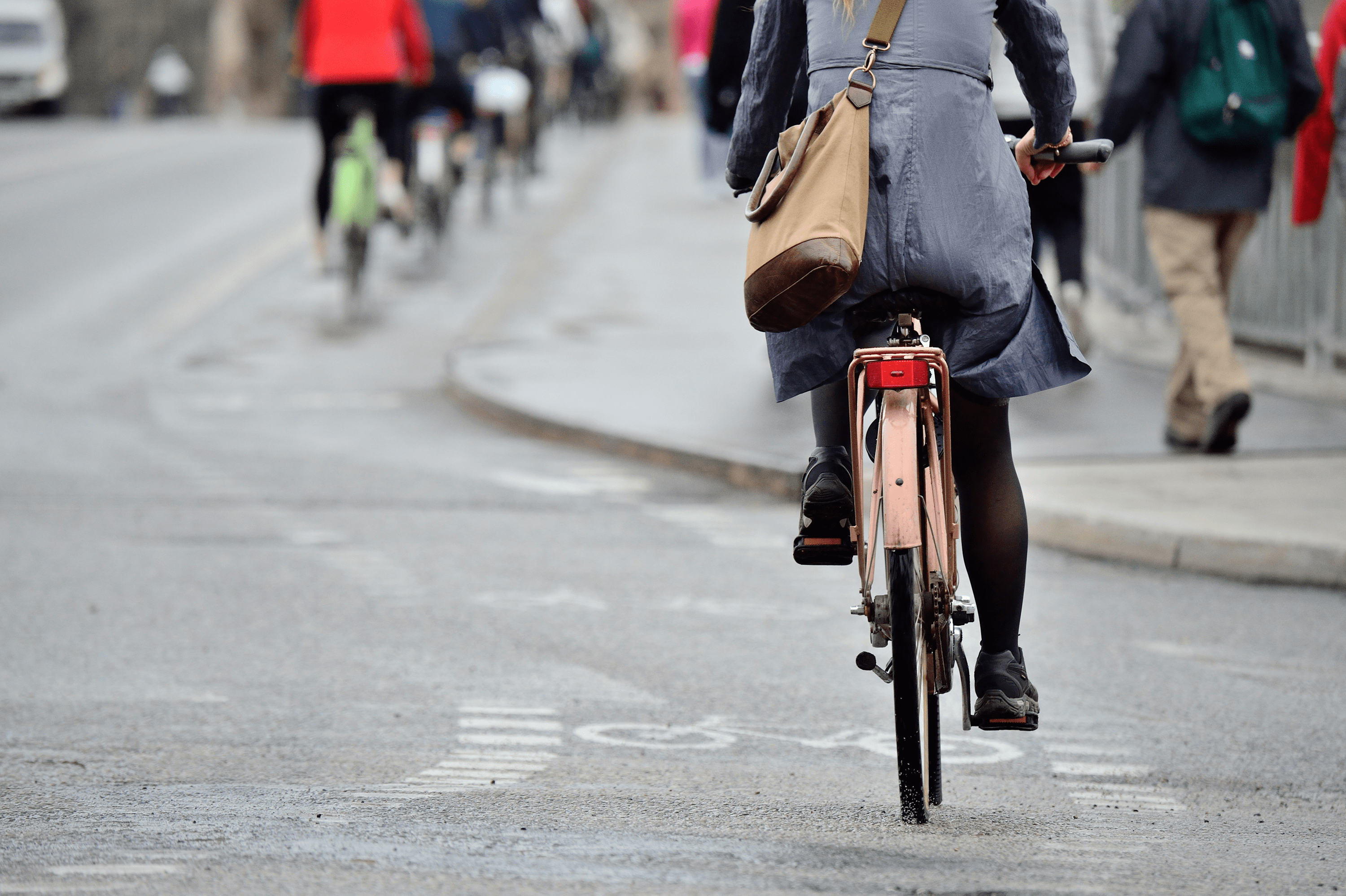 Bicyclists travelling on protected bike lanes in Chicago, IL